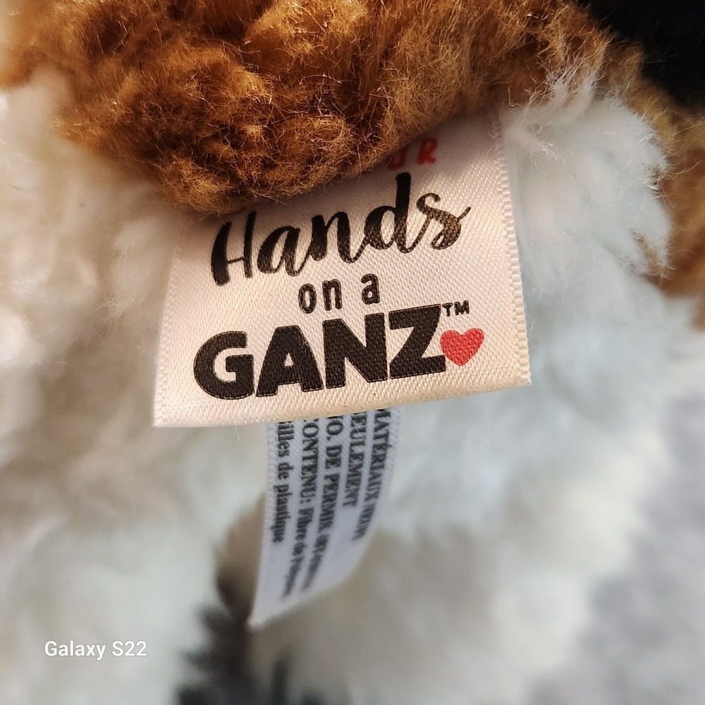 Hands on a Ganz Plush Dog Tricolor Terrier Stuffed Animal White Brown Black - Picture 8 of 11